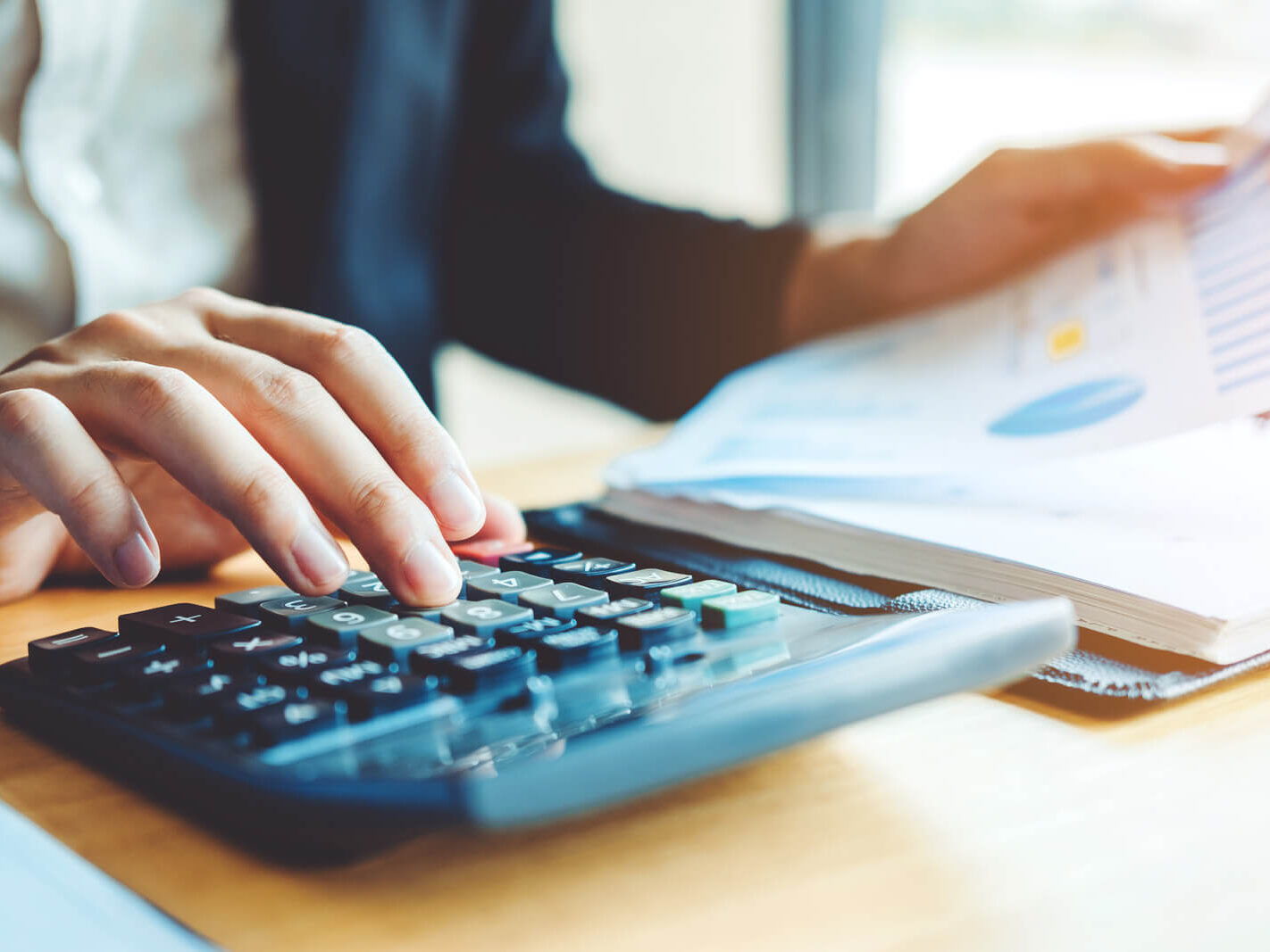 Canva-Business-man-Accounting-Calculating-Cost-Economic-Financial-data-analyzing-counting
